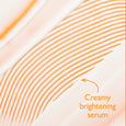 Orange and white abstract curved lines with text reading "Creamy brightening serum" on beige background.