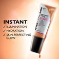 Clear plastic tube with white label and black cap containing bronze-toned liquid serum, 30 ml size.