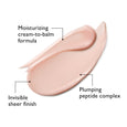 Beige lip filler product swatch showing creamy texture with labeled features for moisturizing formula and plumping complex.