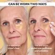 Gold-toned under-eye patches applied to crow's feet on left and under-eye area on right of mature skin model.