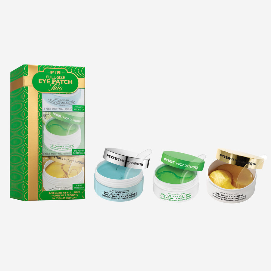 Three full-size eye patch containers in turquoise, green, and gold with white lids and branded labels, displayed with origina
