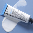 White acne treatment gel tube with blue cap and pump dispenser, shown with swatched product on blue background.