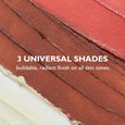 Three swatches of shimmering bronze and coral-toned cream stick products with varying depths of color.